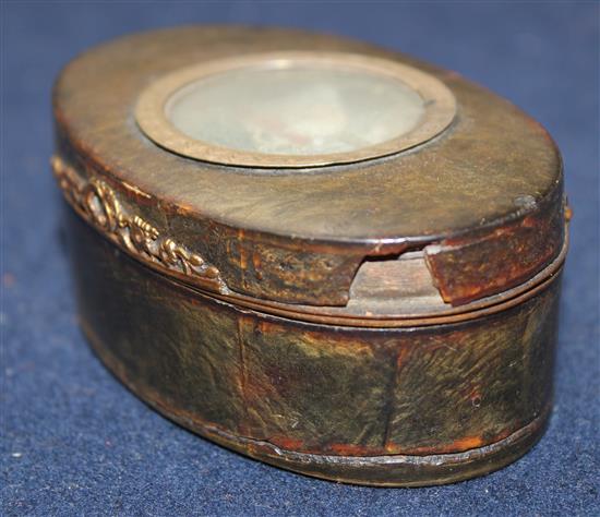 A Regency tortoiseshell snuff box inset with a miniature of a toy spaniel 3.5in.